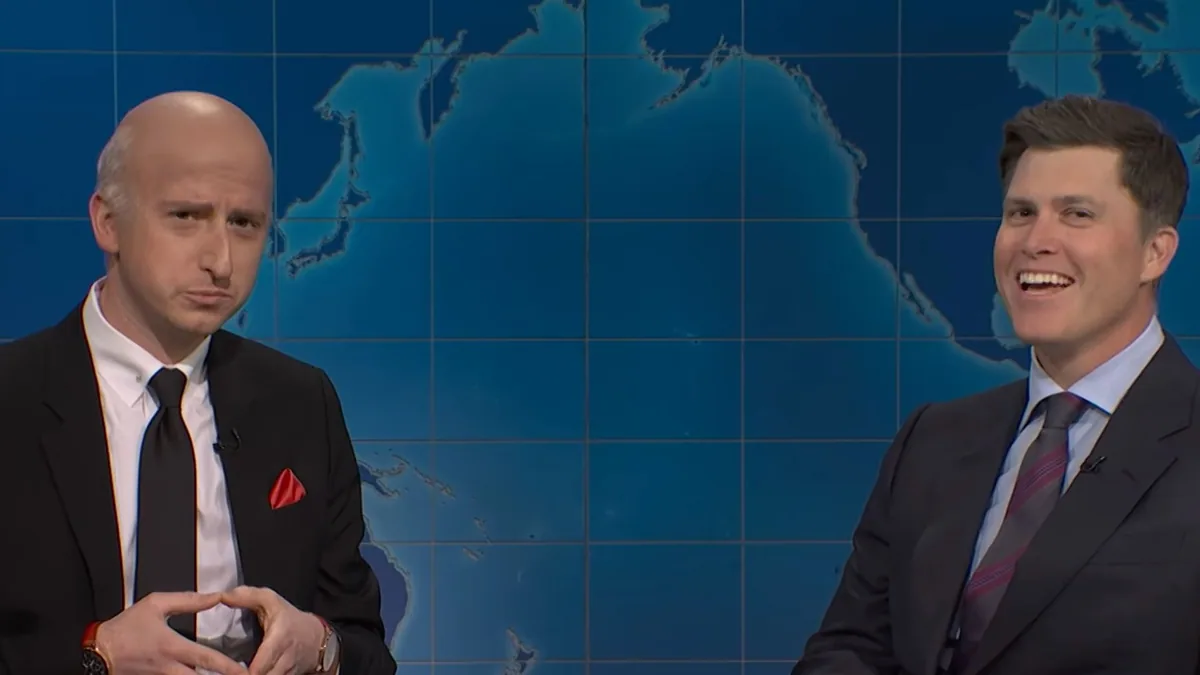 colin jost jokes about scarlett johansson's financial status